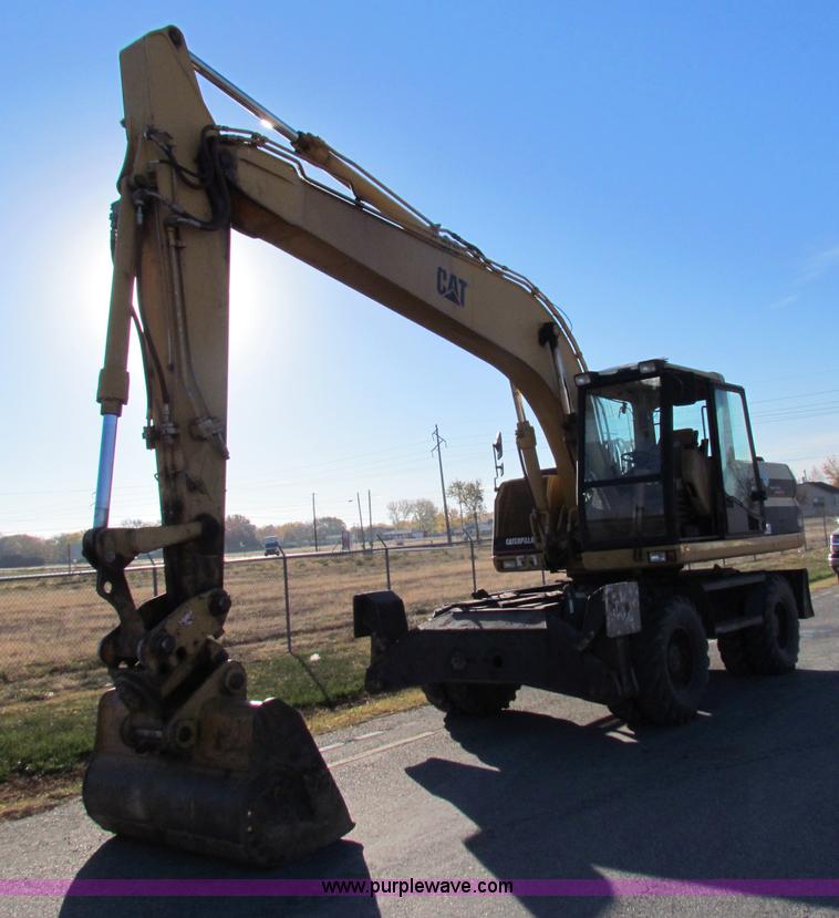 image for item E8168 1998 Caterpillar M318 mobile excavator