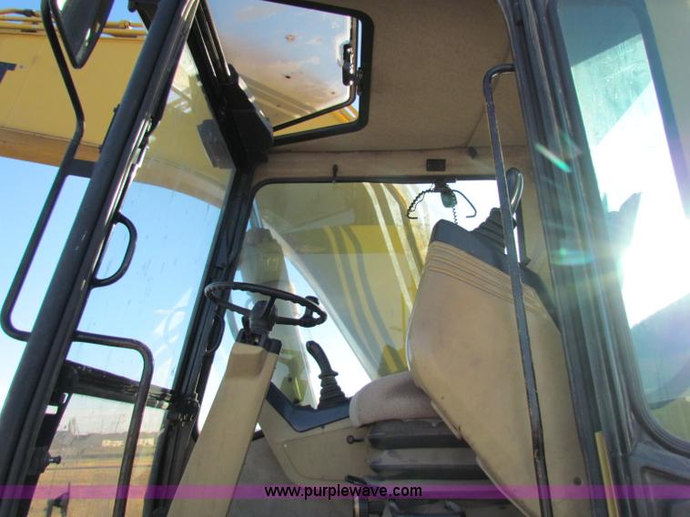 image for item E8168 1998 Caterpillar M318 mobile excavator