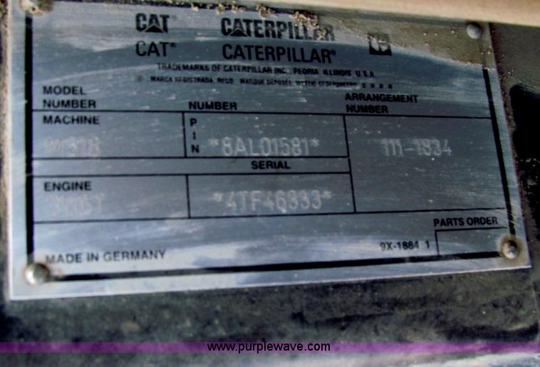 image for item E8168 1998 Caterpillar M318 mobile excavator