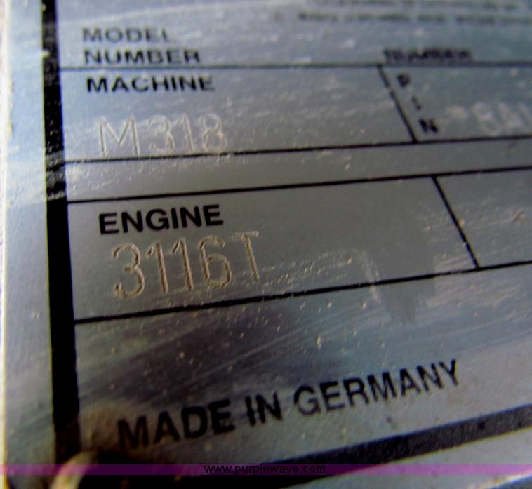 image for item E8168 1998 Caterpillar M318 mobile excavator