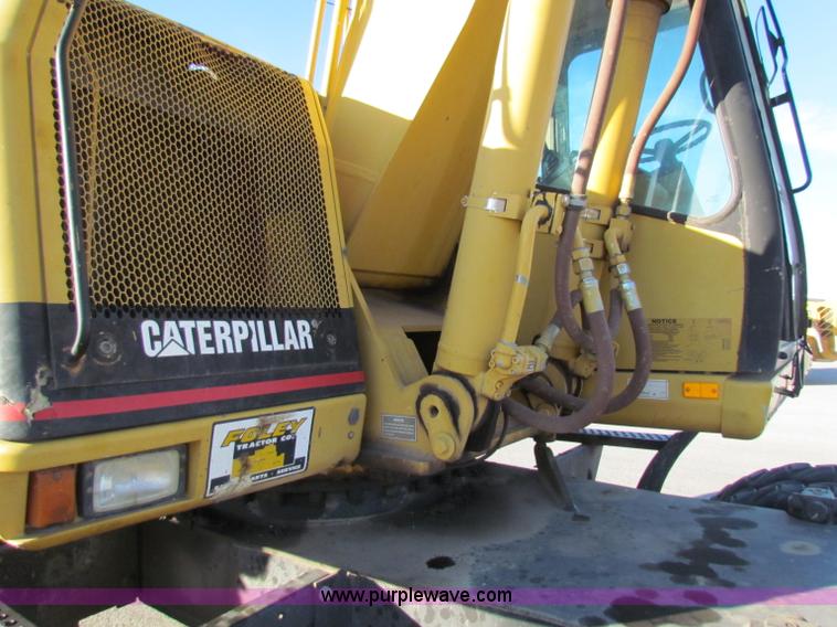 image for item E8168 1998 Caterpillar M318 mobile excavator