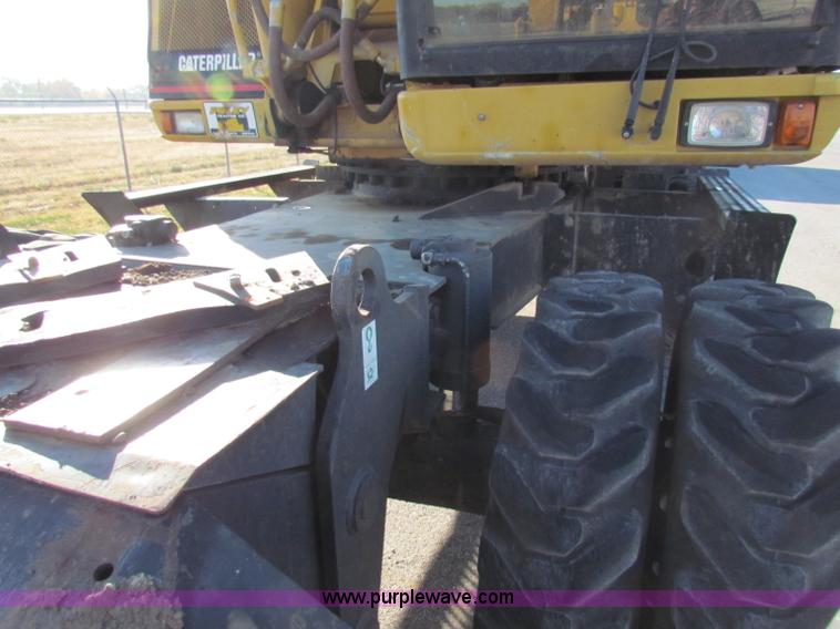 image for item E8168 1998 Caterpillar M318 mobile excavator