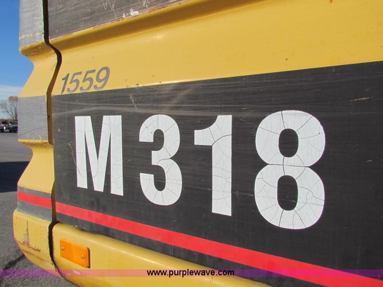 image for item E8168 1998 Caterpillar M318 mobile excavator