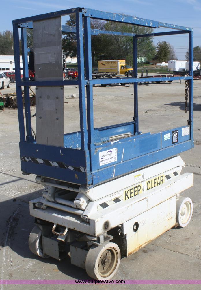 image for item F2715 1994 Skyjack M3015 electric scissor lift
