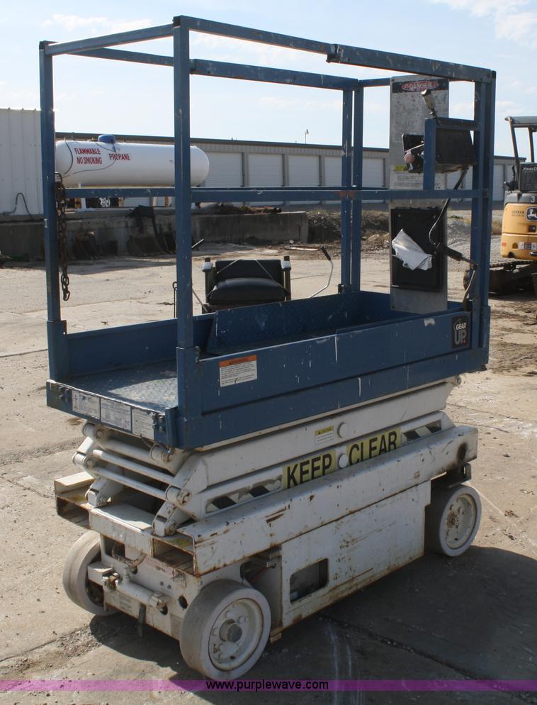image for item F2715 1994 Skyjack M3015 electric scissor lift
