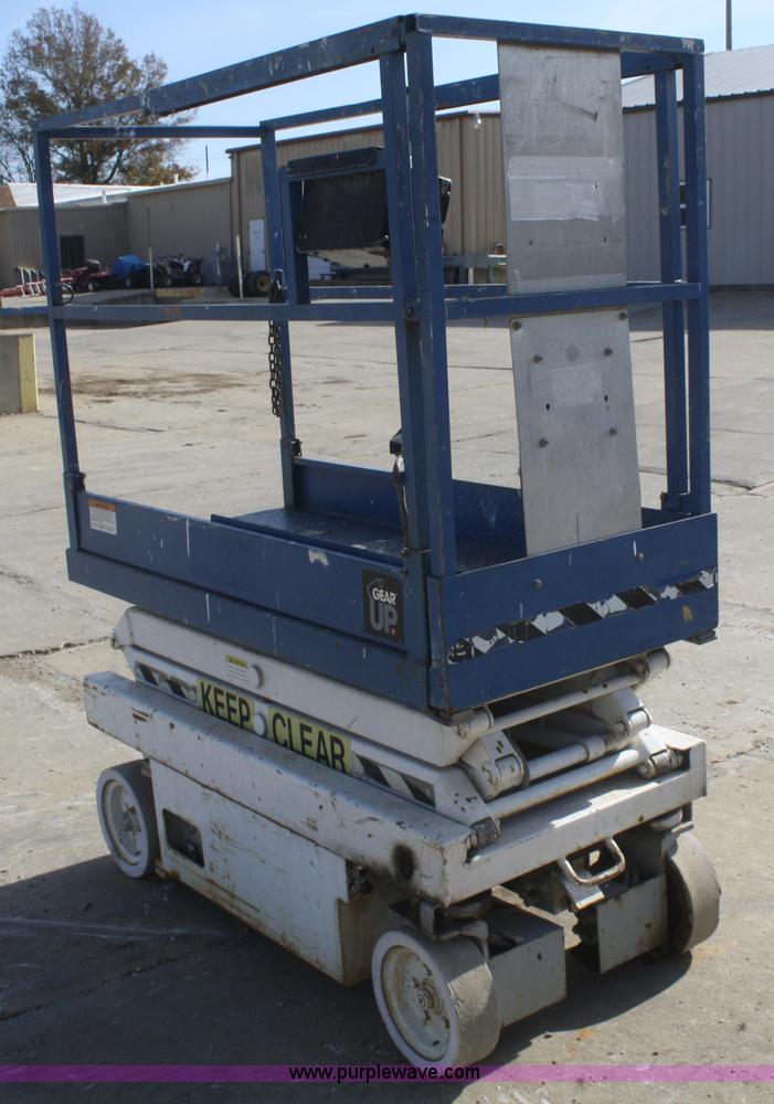 image for item F2715 1994 Skyjack M3015 electric scissor lift