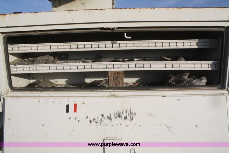 image for item F2738 2001 International 4700 digger derrick truck