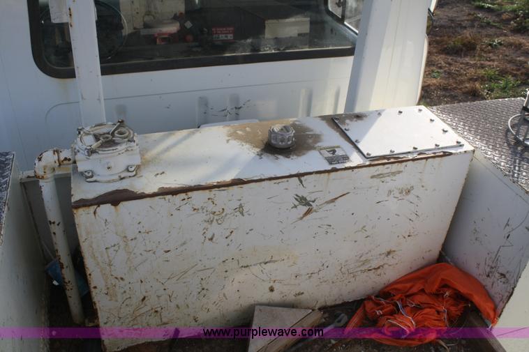 image for item F2738 2001 International 4700 digger derrick truck