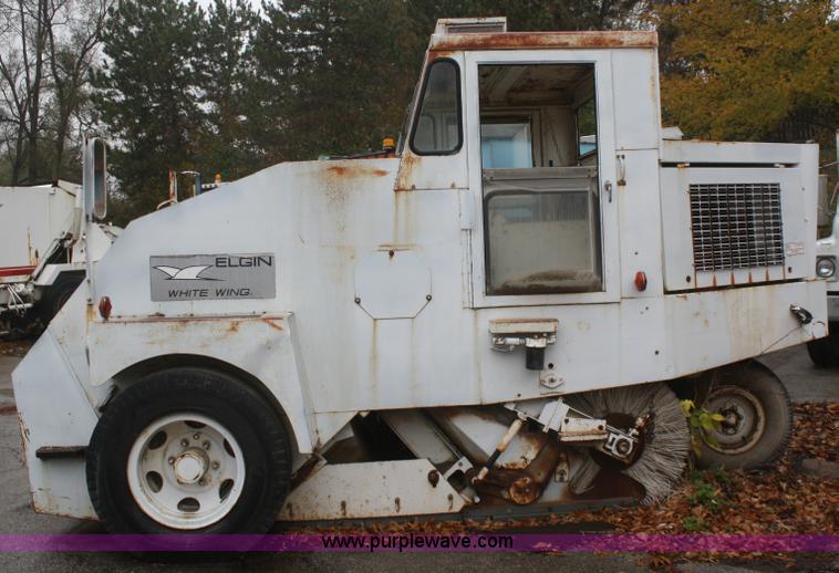 image for item F2749 Elgin White Whirlwind T street sweeper