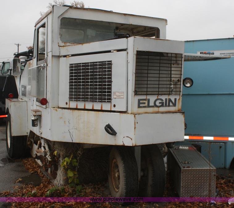 image for item F2749 Elgin White Whirlwind T street sweeper