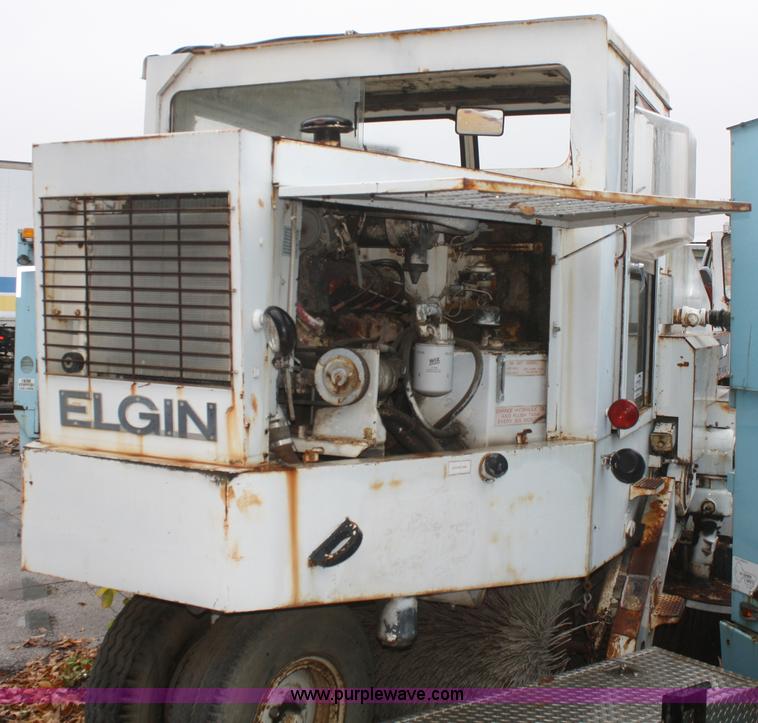 image for item F2749 Elgin White Whirlwind T street sweeper