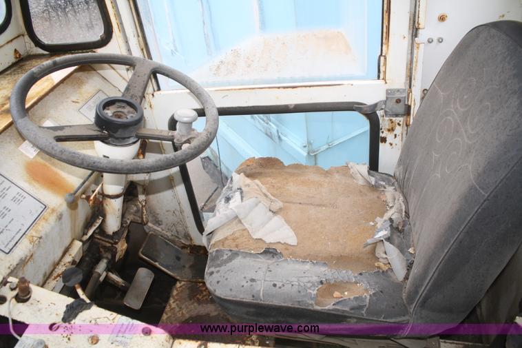 image for item F2749 Elgin White Whirlwind T street sweeper