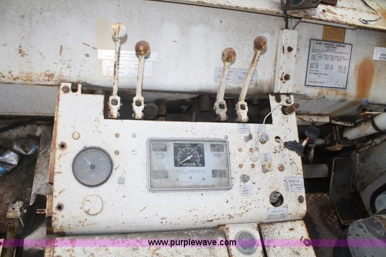 image for item F2749 Elgin White Whirlwind T street sweeper