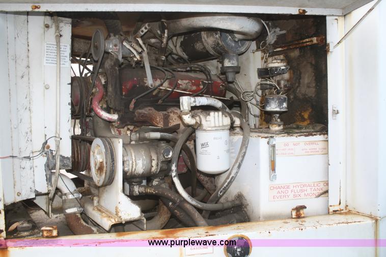 image for item F2749 Elgin White Whirlwind T street sweeper