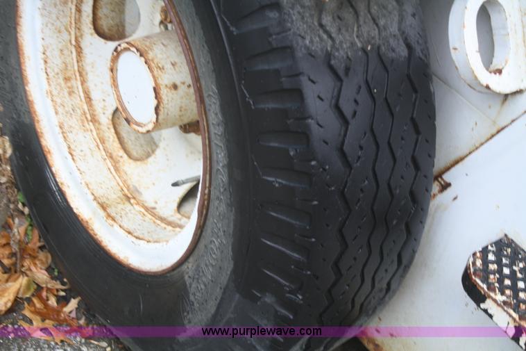 image for item F2749 Elgin White Whirlwind T street sweeper