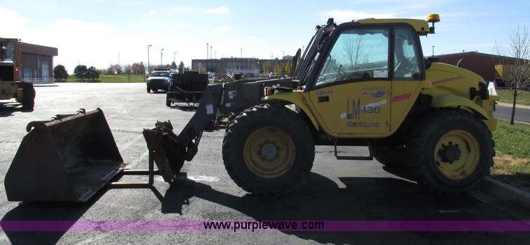 image for item F4015 2002 New Holland LM430 ATPTMC telehandler