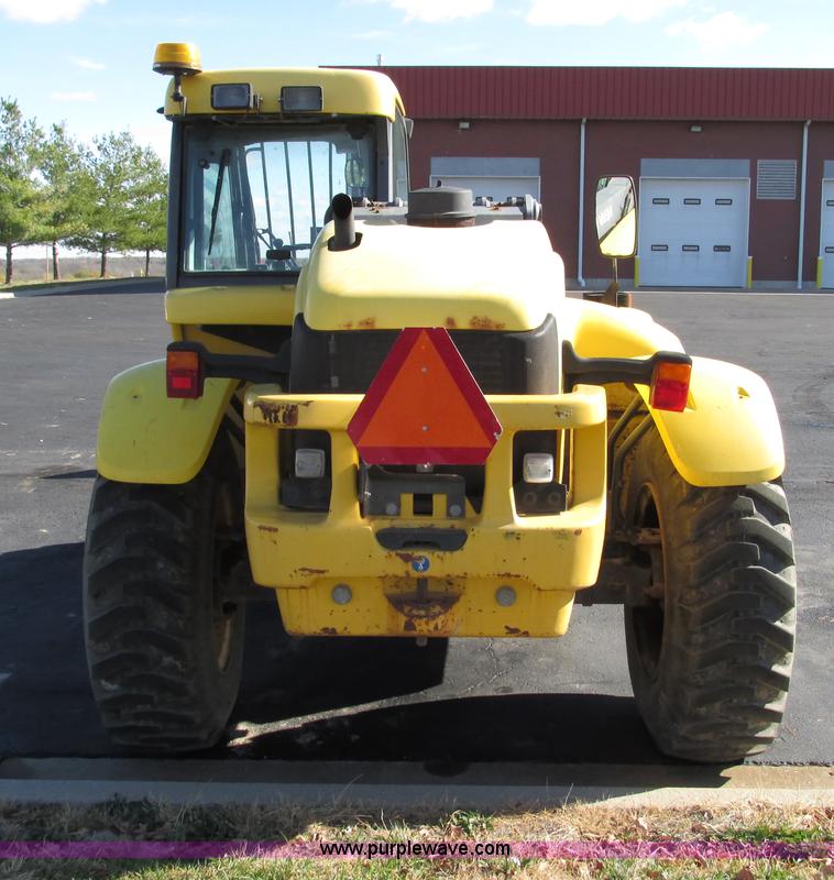 image for item F4015 2002 New Holland LM430 ATPTMC telehandler