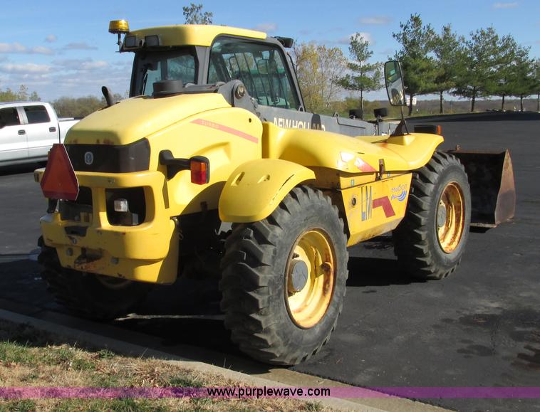 image for item F4015 2002 New Holland LM430 ATPTMC telehandler