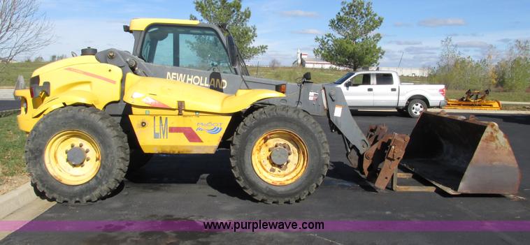 image for item F4015 2002 New Holland LM430 ATPTMC telehandler