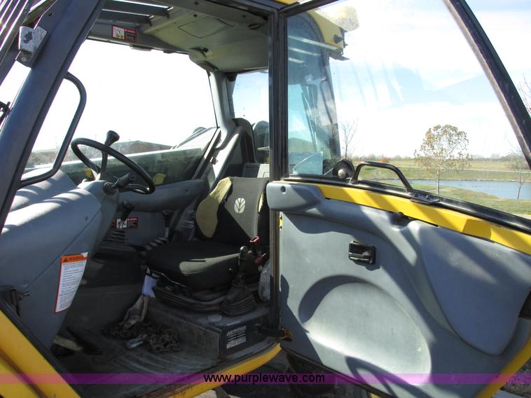 image for item F4015 2002 New Holland LM430 ATPTMC telehandler
