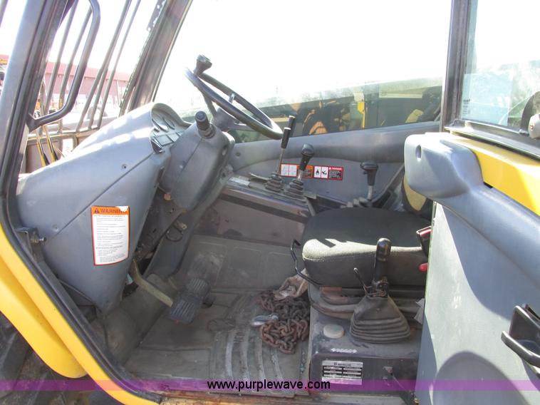 image for item F4015 2002 New Holland LM430 ATPTMC telehandler