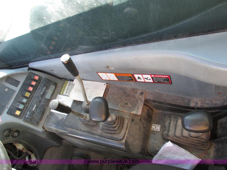 image for item F4015 2002 New Holland LM430 ATPTMC telehandler