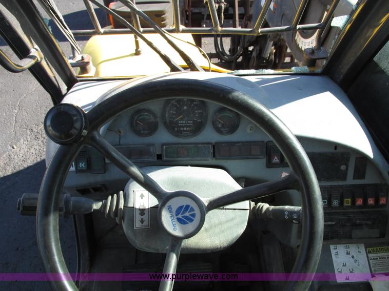 image for item F4015 2002 New Holland LM430 ATPTMC telehandler