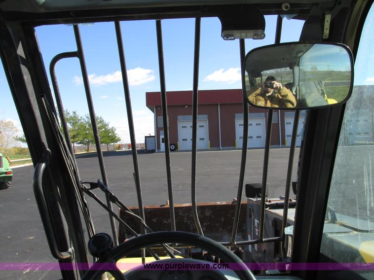 image for item F4015 2002 New Holland LM430 ATPTMC telehandler