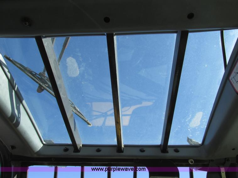 image for item F4015 2002 New Holland LM430 ATPTMC telehandler