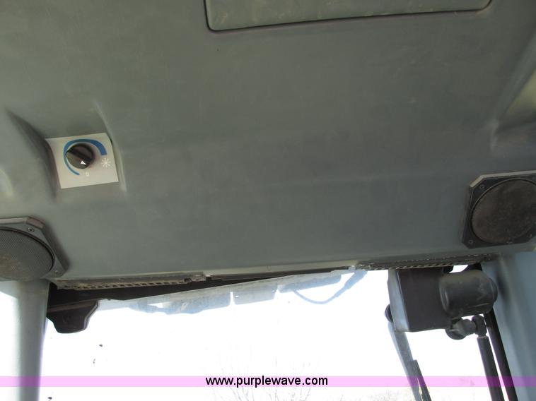 image for item F4015 2002 New Holland LM430 ATPTMC telehandler