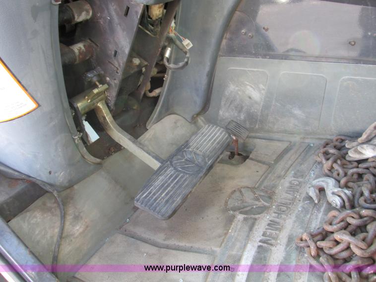 image for item F4015 2002 New Holland LM430 ATPTMC telehandler