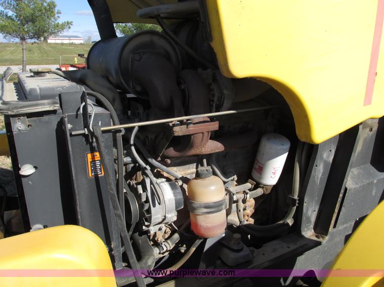 image for item F4015 2002 New Holland LM430 ATPTMC telehandler