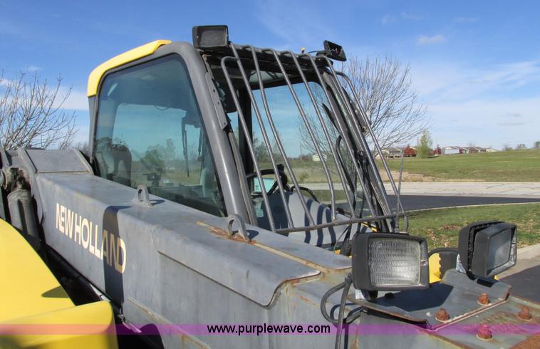 image for item F4015 2002 New Holland LM430 ATPTMC telehandler