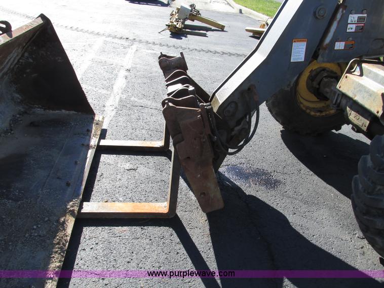 image for item F4015 2002 New Holland LM430 ATPTMC telehandler