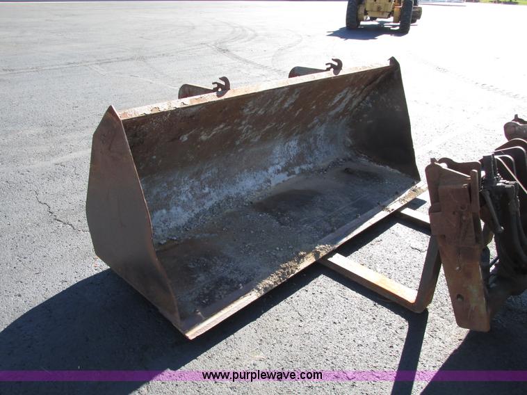 image for item F4015 2002 New Holland LM430 ATPTMC telehandler