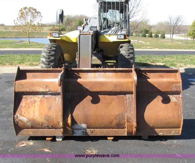 image for item F4015 2002 New Holland LM430 ATPTMC telehandler