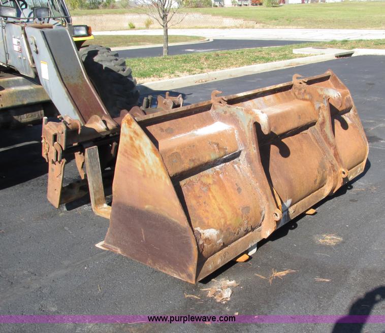 image for item F4015 2002 New Holland LM430 ATPTMC telehandler