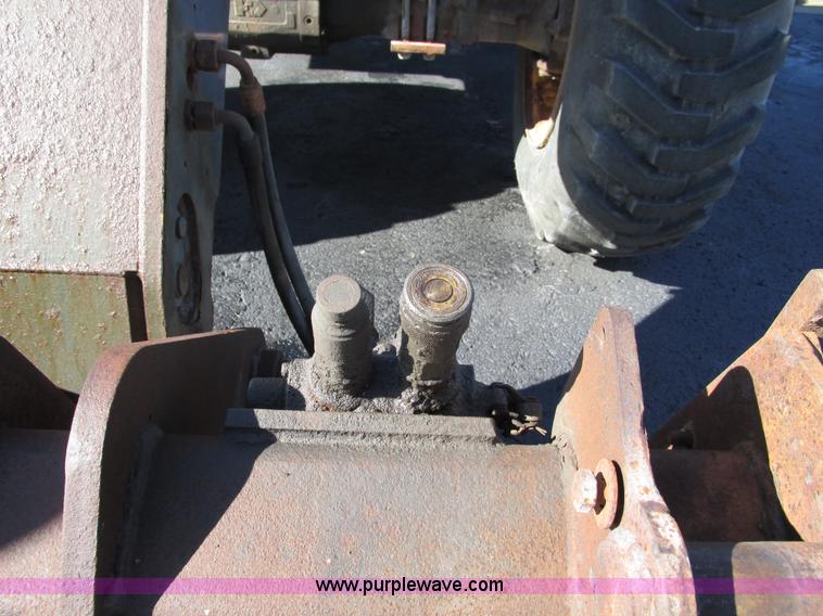 image for item F4015 2002 New Holland LM430 ATPTMC telehandler