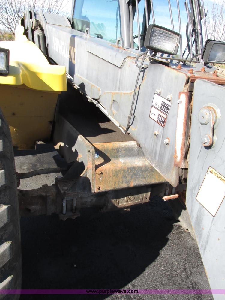 image for item F4015 2002 New Holland LM430 ATPTMC telehandler