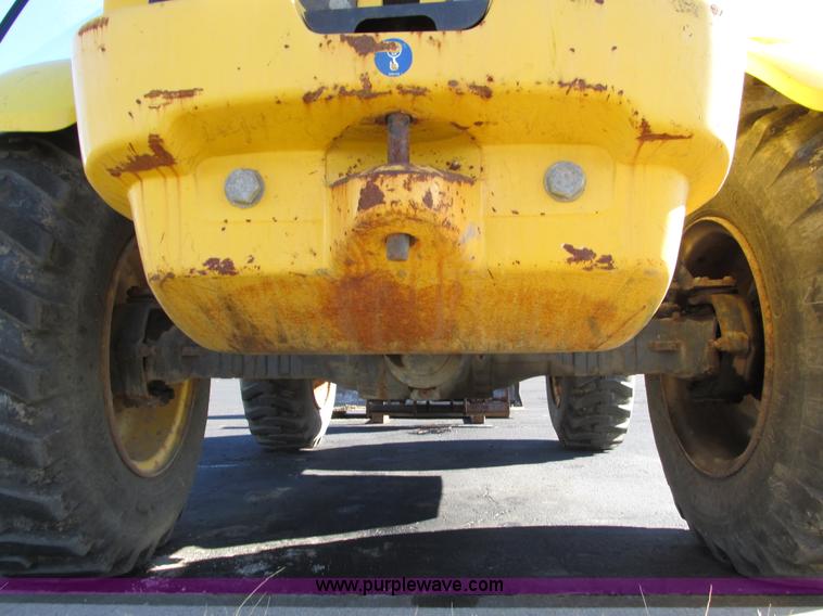 image for item F4015 2002 New Holland LM430 ATPTMC telehandler