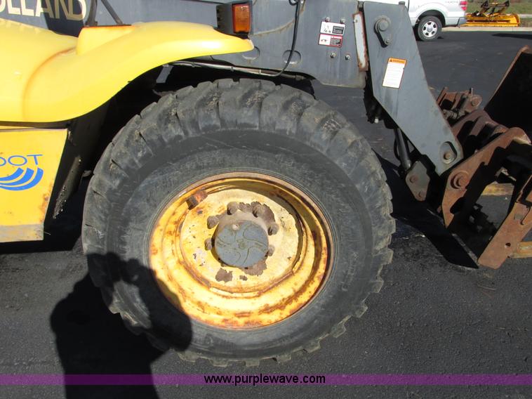 image for item F4015 2002 New Holland LM430 ATPTMC telehandler