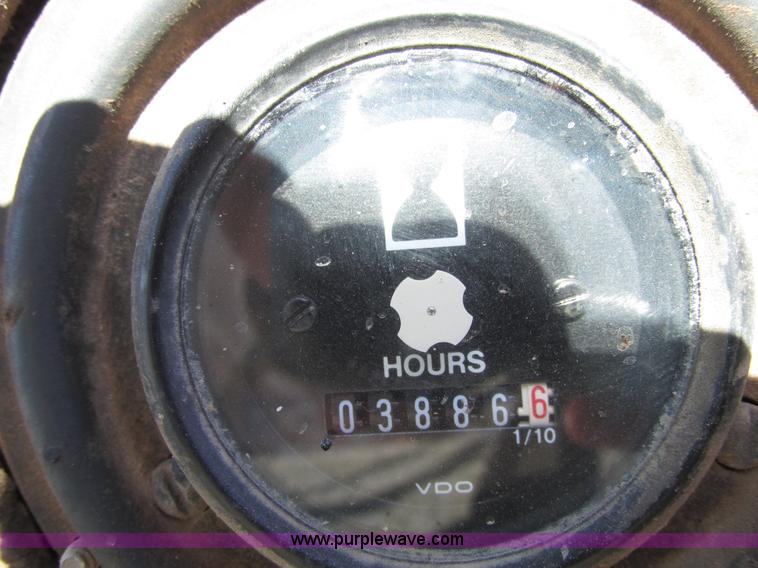 image for item F4016 1994 Champion 720A Series III articulated motor grader