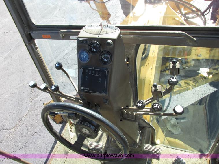 image for item F4016 1994 Champion 720A Series III articulated motor grader