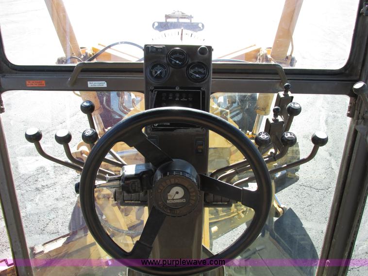 image for item F4016 1994 Champion 720A Series III articulated motor grader