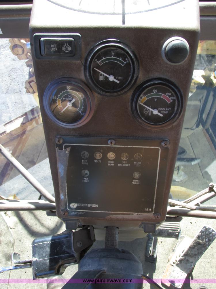 image for item F4016 1994 Champion 720A Series III articulated motor grader