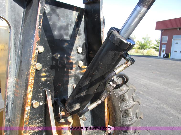 image for item F4016 1994 Champion 720A Series III articulated motor grader