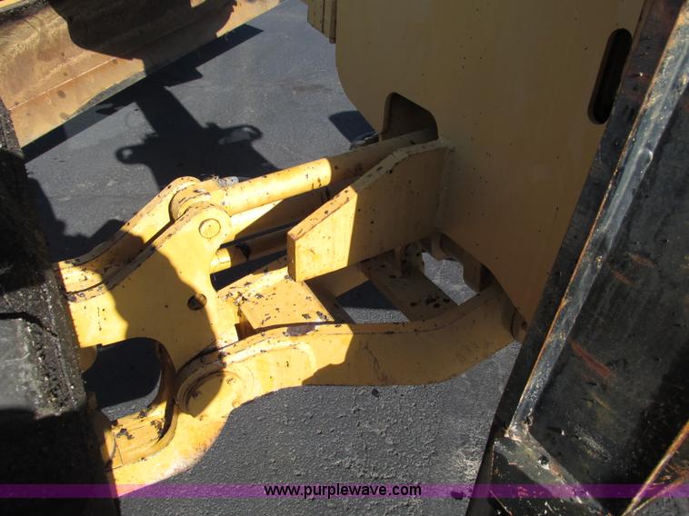 image for item F4016 1994 Champion 720A Series III articulated motor grader