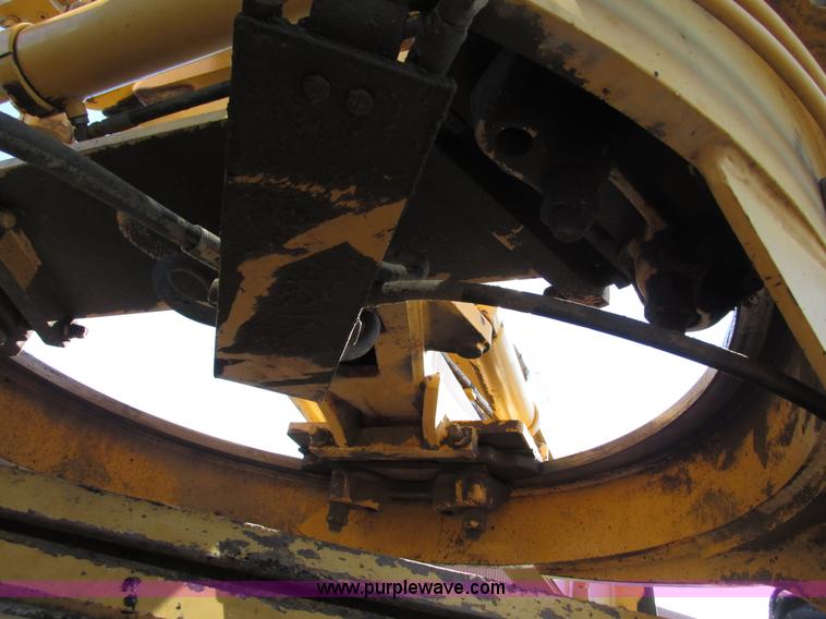 image for item F4016 1994 Champion 720A Series III articulated motor grader