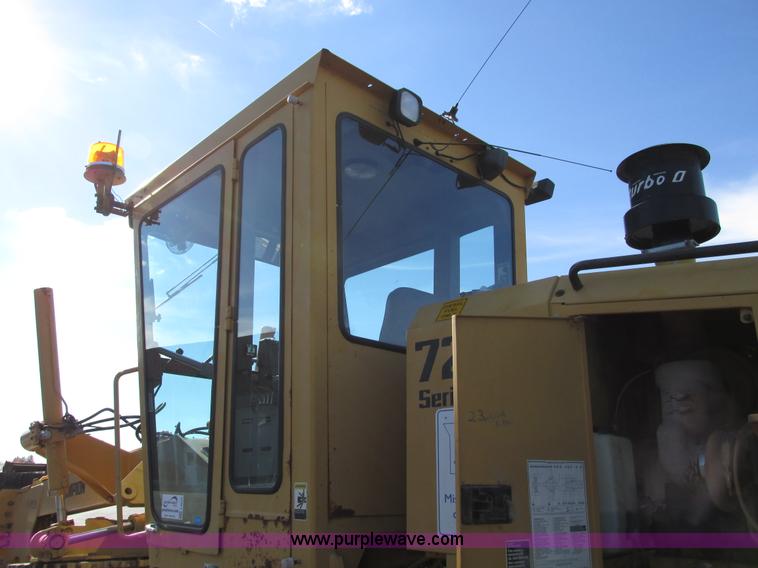 image for item F4016 1994 Champion 720A Series III articulated motor grader