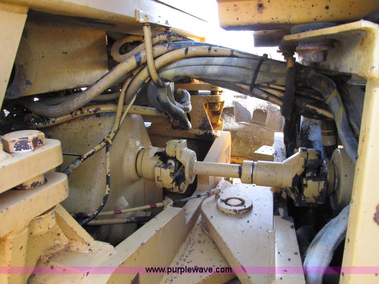 image for item F4016 1994 Champion 720A Series III articulated motor grader